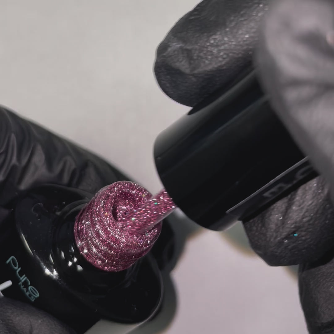 Product video showcasing Pure Nails' Halo glitter gel polish in shade 'Enchanted Rose'