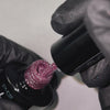 Product video showcasing Pure Nails' Halo glitter gel polish in shade 'Enchanted Rose'
