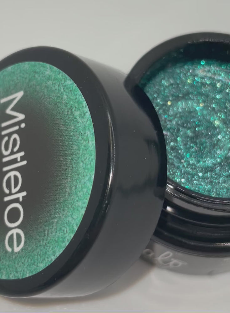 
            
                Videó betöltése és lejátszása a Galériamegjelenítőben, Product video of Pure Nails&amp;#39; Halo glitter gel polish in shade &amp;#39;Mistletoe&amp;#39; 
            
        