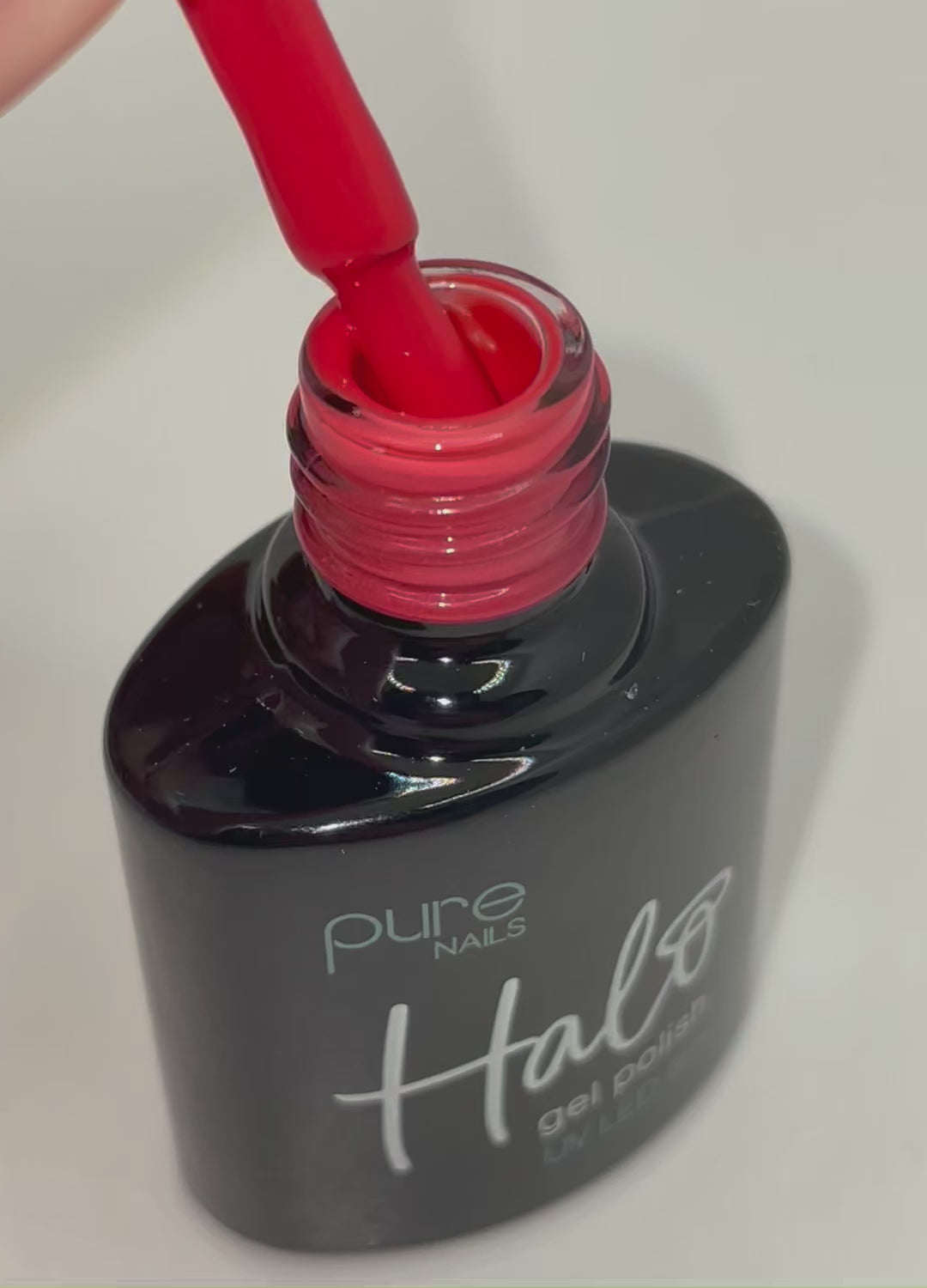 Product video of Pure Nails' Halo gel polish in shade 'Coral Pink' 