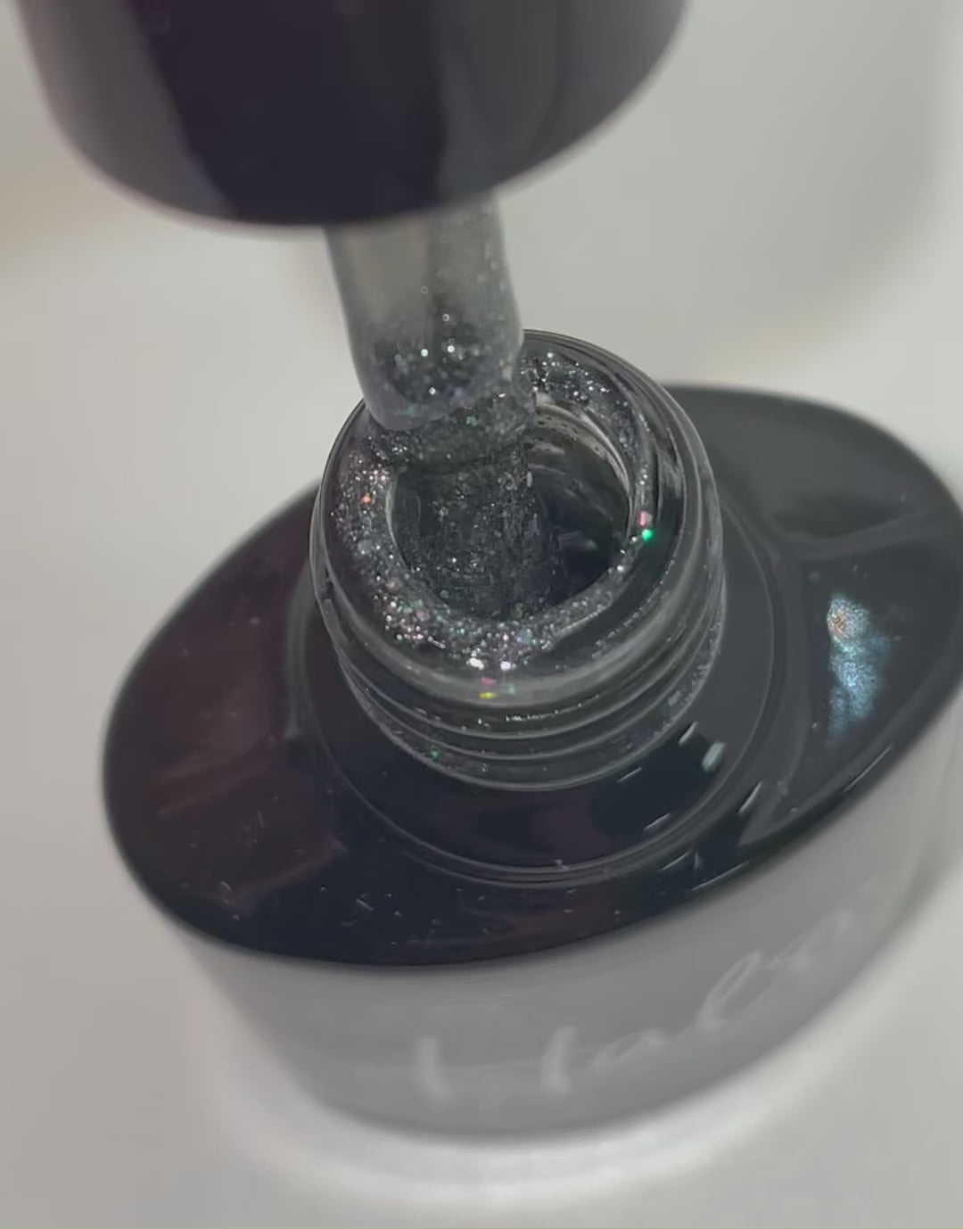 Product video of Pure Nails' Halo gel polish in the shade 'Black Magic'